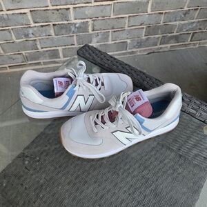 Barely Worn Men's New Balance white blue light tan walking shoes.